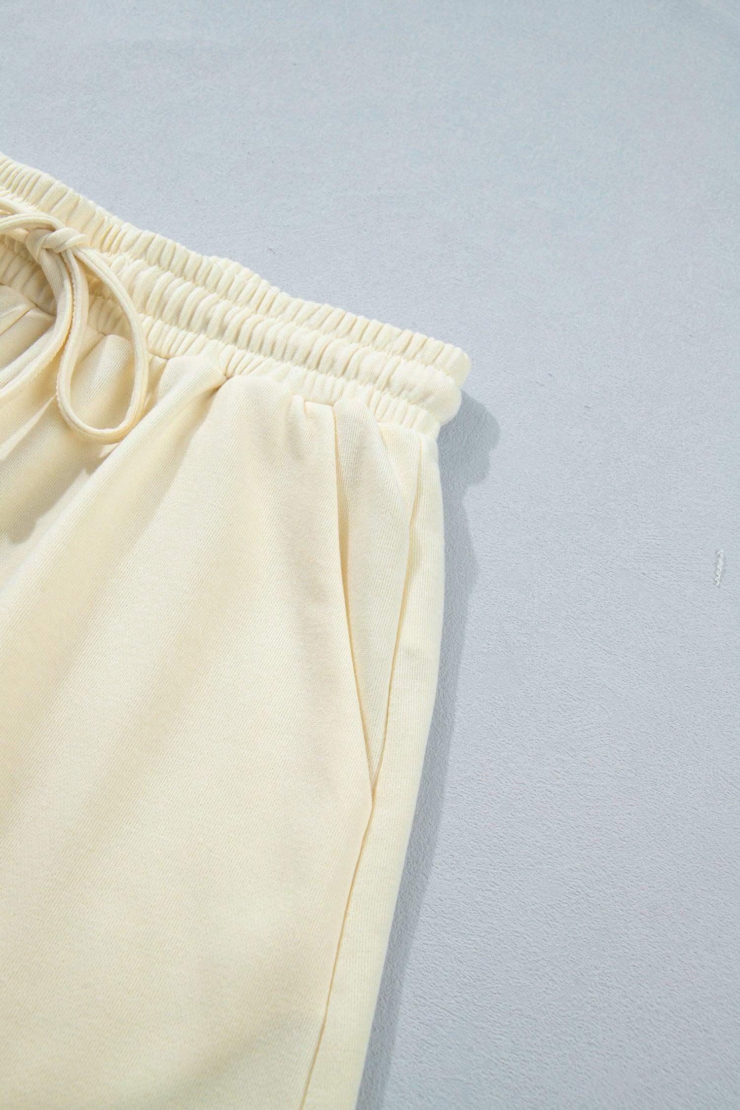White Contrast Leopard Bow Patched V Neck Loose Tee Drawstring Shorts 2pcs Outfit